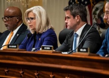WASHINGTON, DC - OCTOBER 19: Vice Chair Liz Cheney, R-Wyo., flanked by Chairman Bennie Thompson, D-Miss., and Rep. Adam Kinzinger, R-Ill., speaks as the House select committee investigating the Jan. 6 insurrection of the Capitol meets to vote on holding Steve Bannon, former President J. Donald Trump's allies in contempt, on Capitol Hill on Tuesday, Oct. 19, 2021 in Washington, DC. (Photo by Jabin Botsford/The Washington Post via Getty Images)