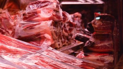 macro photography of meat in chiller
